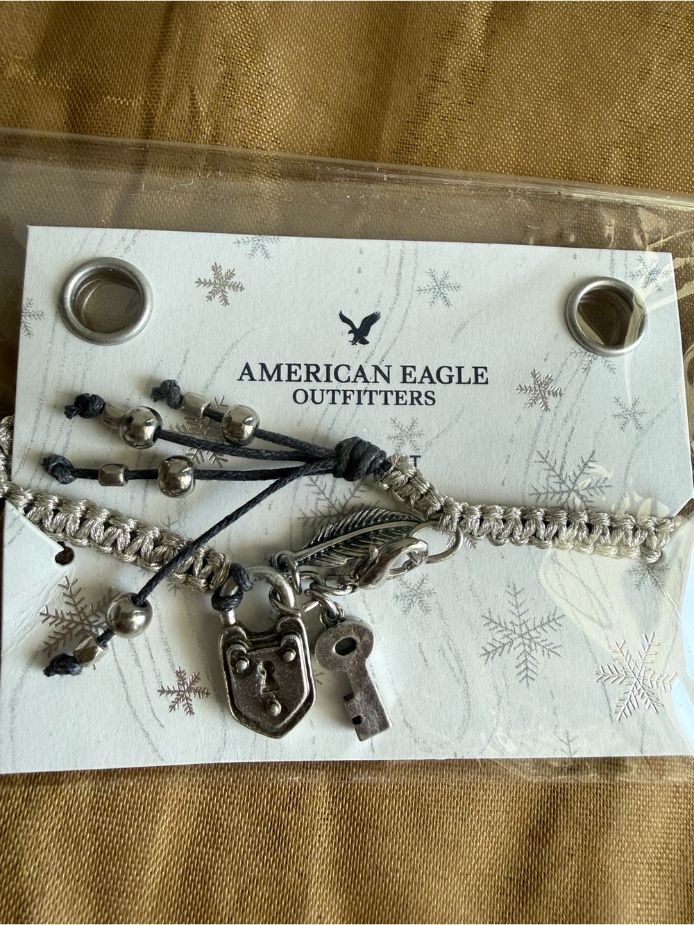 American Eagle Outfitters Silver-Tone Charm Bracelet with Key, Bear & Feather